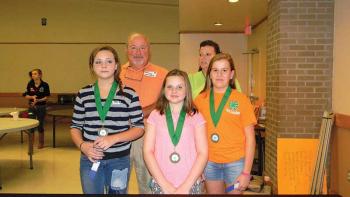 SUGAR WINNERS - Standing in front, from left, are the winners of the Sugar Division categories, Whitney Ledoux, baked; MacKenzie Maier, non-baked; and Karina Parks, Division I sugar ambassador. They are shown with Fontenot and Buller.