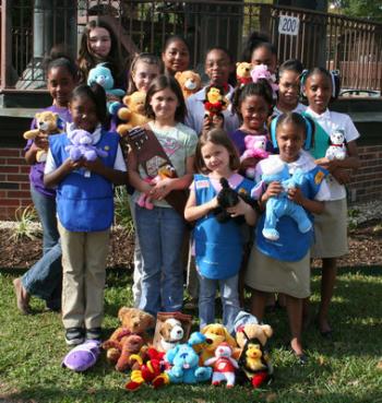 Girl Scouts Pines to the Gulf Service Unit 620 has donated stuffed animals to Faith House to bring more comfort to the lives of children there. The girls hope the donations will help the children to feel more secure and welcomed. Pictured above, from left to right, starting from the back row, are Tabitha Manuel, Annie Edwards, Jasmine Jack, Caitlin Jack, Zoe Duplechain, Alexa Poullard, Nadia Williams, Kathlyn Ben, Morgan McDaniel, Treliney Smith, Jakayla Anderson, Ainsley McDaniel and Chaslyn Anderson.