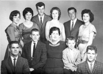Olite Sonnier and her children. From left to right, top row, they are Joyce Sonnier Broussard, Wanda Sonnier Mallett, Warren Sonnier, Ella Mae Sonnier Hebert, Ruston Sonnier, and Theresa "Russie" Sonnier Vincent, and bottom row, Eugene Sonnier, Lester Sonnier, Olite Benoit Sonnier, Willard Sonnier, and Irvin Sonnier.